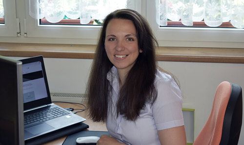 Irena Hostakova at her desk